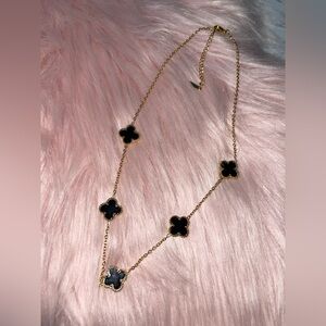 Elegant Gold and Black Clover Necklace